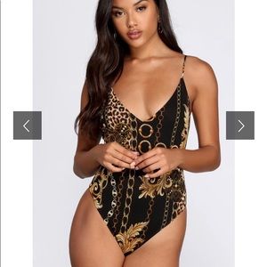 NWT Black and gold body suit